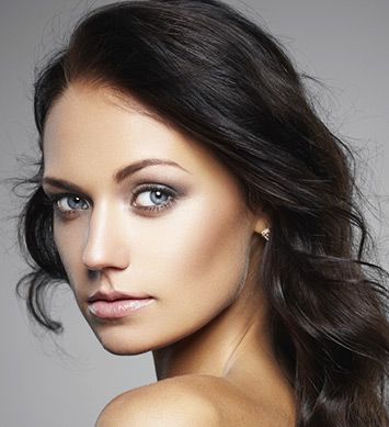 nose procedures feature Woman smiling after getting nose procedure from Chicago Plastic Surgery LLC